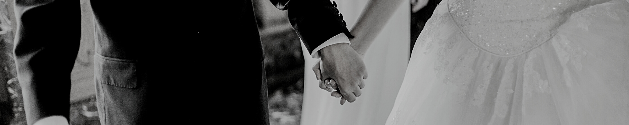 bride and groom holding hands 